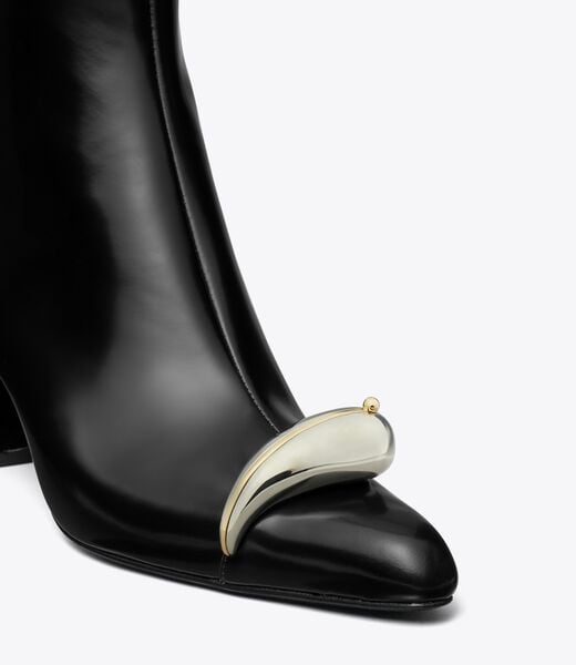 tory burch حذاء الكاحل المثقوب