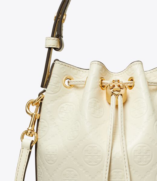 tory burch حقيبة دلو تي مونوغرام صغيرة جلدية