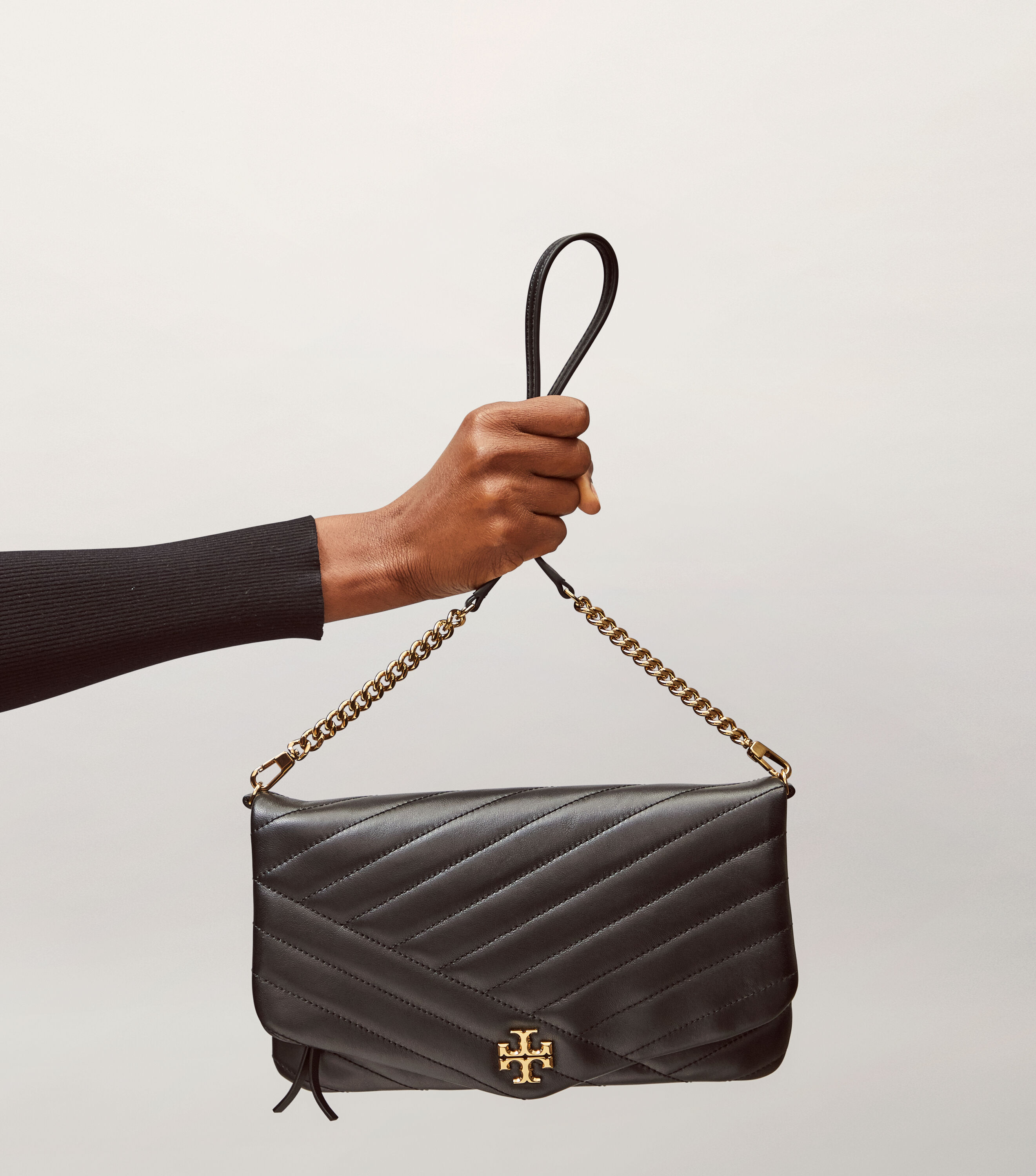 Kira chevron clutch bag 2025