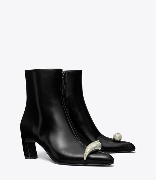 tory burch حذاء الكاحل المثقوب